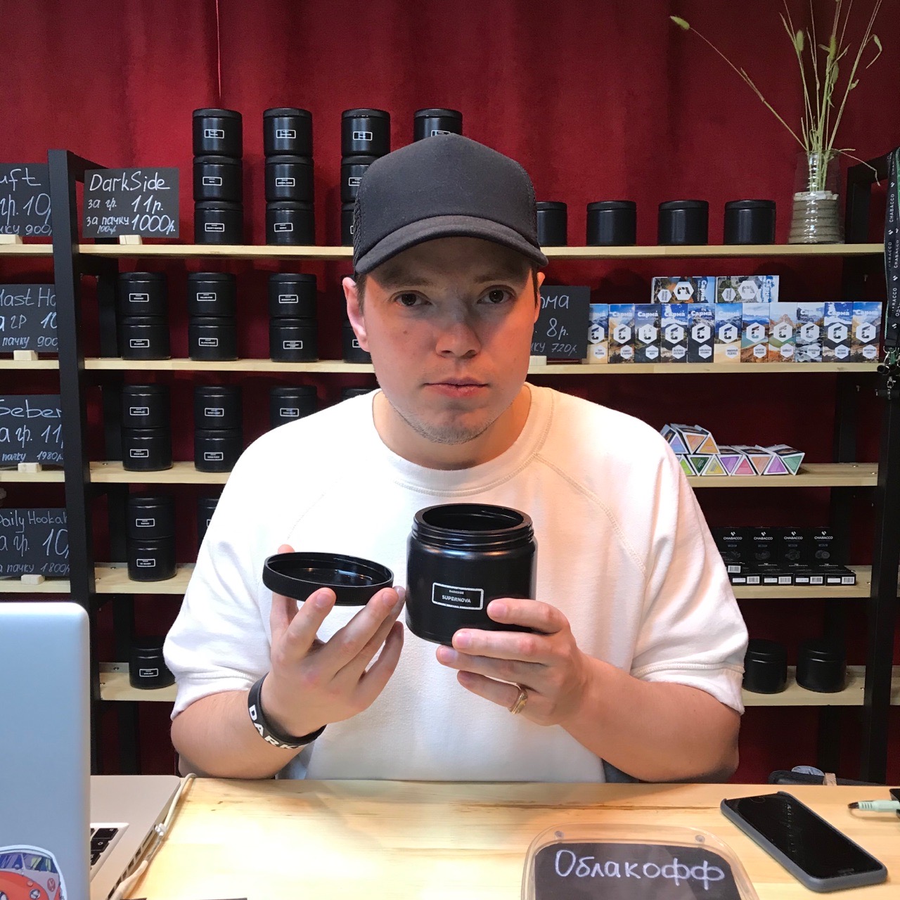 Robert Ivanov with a product in an Oblakoff store
