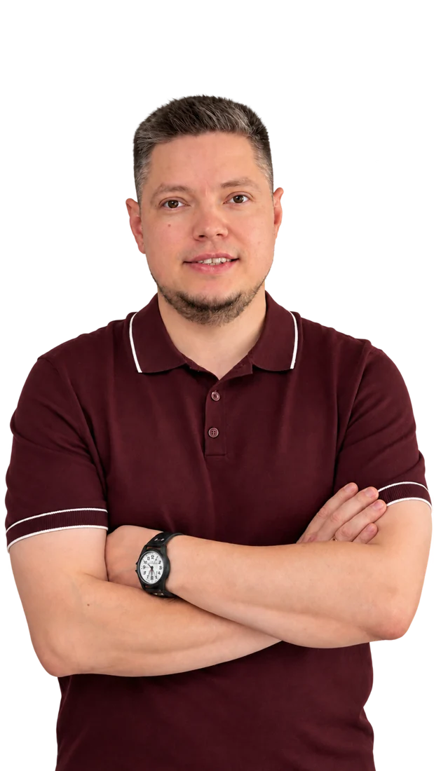 Robert Ivanov in a burgundy polo